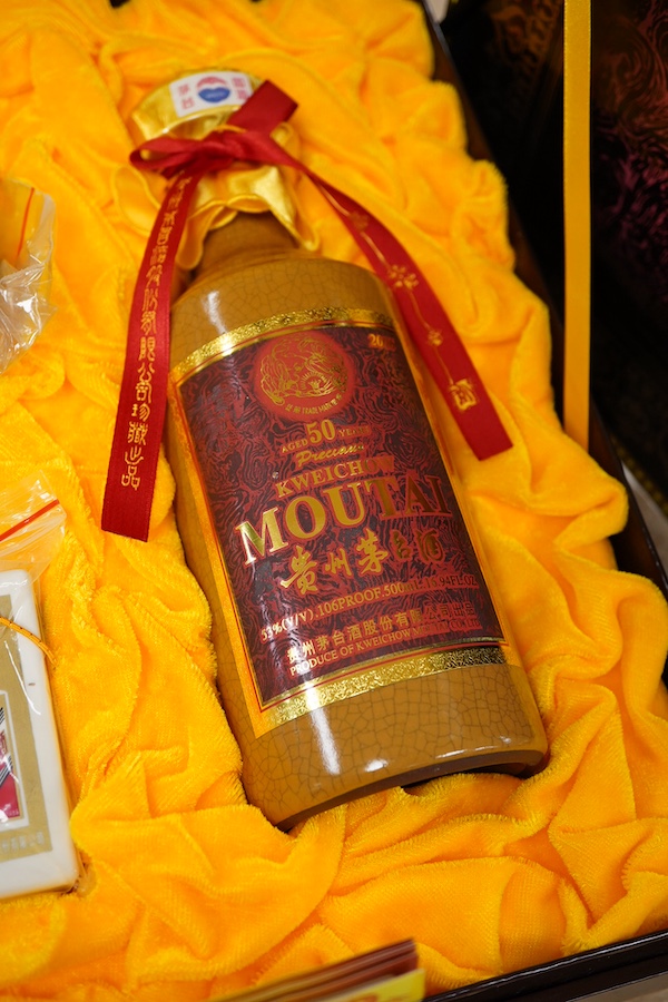 A bottle of Kweichow Moutai, aged 50 years in presentation case and with carrier bag